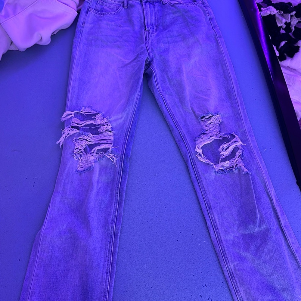 Have been worn a couple times. A little stain up by the pocket!